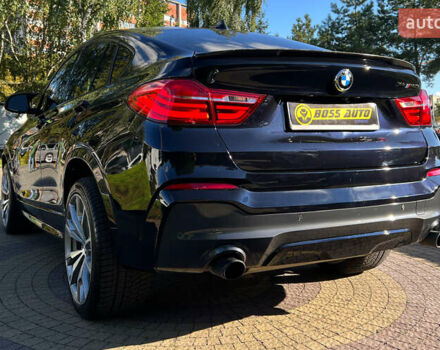 Синий БМВ Х4, объемом двигателя 3 л и пробегом 100 тыс. км за 20300 $, фото 4 на Automoto.ua