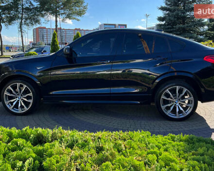 Синий БМВ Х4, объемом двигателя 3 л и пробегом 100 тыс. км за 20300 $, фото 3 на Automoto.ua