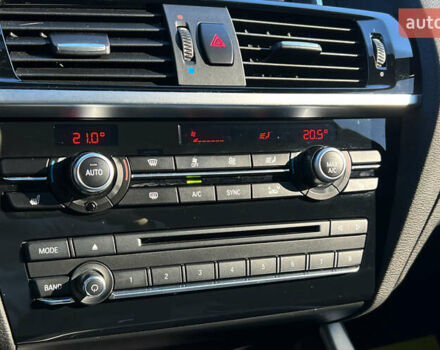 Синий БМВ Х4, объемом двигателя 3 л и пробегом 100 тыс. км за 20300 $, фото 26 на Automoto.ua