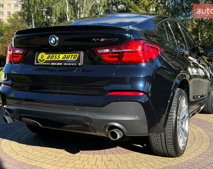 Синий БМВ Х4, объемом двигателя 3 л и пробегом 100 тыс. км за 20300 $, фото 6 на Automoto.ua