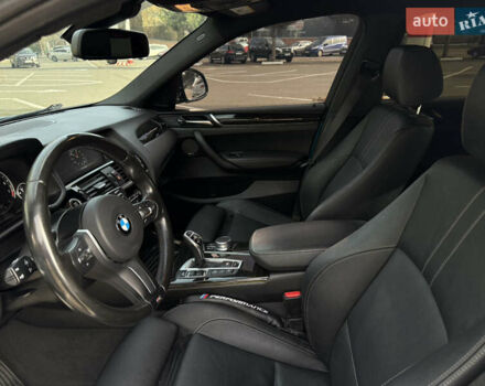 Синій БМВ Х4, об'ємом двигуна 2.98 л та пробігом 130 тис. км за 28300 $, фото 25 на Automoto.ua
