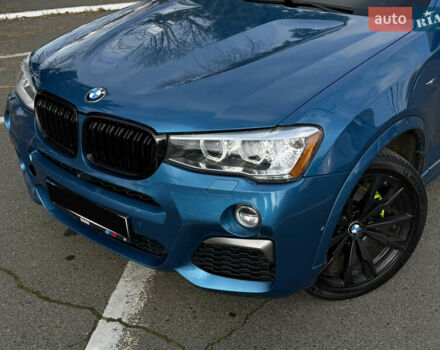 Синій БМВ Х4, об'ємом двигуна 2.98 л та пробігом 130 тис. км за 28300 $, фото 2 на Automoto.ua