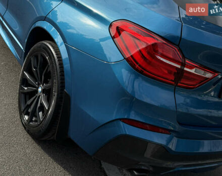 Синій БМВ Х4, об'ємом двигуна 2.98 л та пробігом 130 тис. км за 28300 $, фото 8 на Automoto.ua