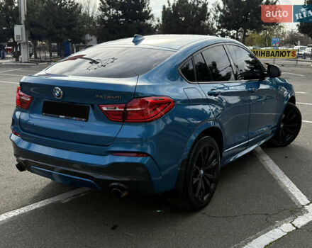 Синій БМВ Х4, об'ємом двигуна 2.98 л та пробігом 130 тис. км за 28300 $, фото 9 на Automoto.ua
