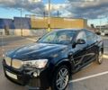 Синий БМВ Х4, объемом двигателя 2 л и пробегом 93 тыс. км за 21299 $, фото 1 на Automoto.ua