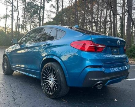 Синий БМВ Х4, объемом двигателя 3 л и пробегом 43 тыс. км за 8300 $, фото 2 на Automoto.ua