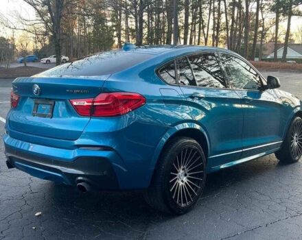 Синий БМВ Х4, объемом двигателя 3 л и пробегом 43 тыс. км за 8300 $, фото 4 на Automoto.ua