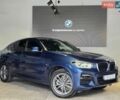 Синий БМВ Х4, объемом двигателя 2 л и пробегом 98 тыс. км за 36500 $, фото 1 на Automoto.ua