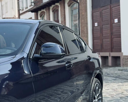 Синий БМВ Х4, объемом двигателя 3 л и пробегом 69 тыс. км за 51000 $, фото 2 на Automoto.ua