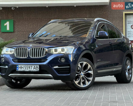 Синий БМВ Х4, объемом двигателя 2 л и пробегом 150 тыс. км за 24900 $, фото 1 на Automoto.ua