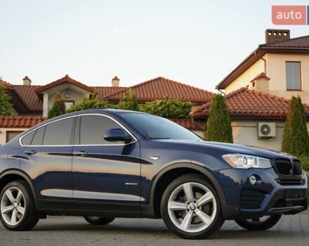 Синий БМВ Х4, объемом двигателя 2 л и пробегом 71 тыс. км за 22999 $, фото 1 на Automoto.ua