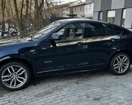 Синий БМВ Х4, объемом двигателя 2 л и пробегом 93 тыс. км за 26800 $, фото 1 на Automoto.ua