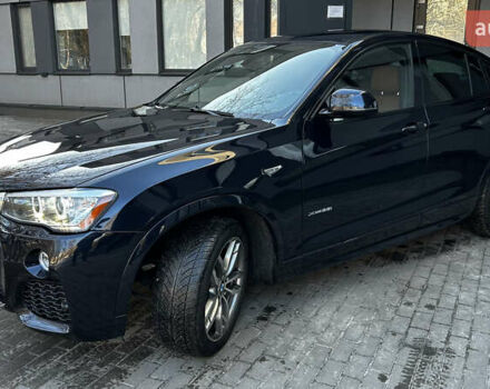 Синий БМВ Х4, объемом двигателя 2 л и пробегом 93 тыс. км за 26800 $, фото 1 на Automoto.ua