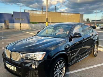 Синий БМВ Х4, объемом двигателя 2 л и пробегом 93 тыс. км за 21299 $, фото 1 на Automoto.ua