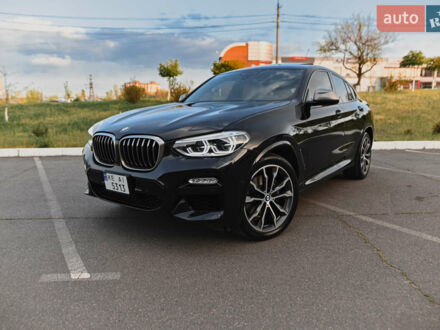 Синий БМВ Х4, объемом двигателя 3 л и пробегом 46 тыс. км за 44400 $, фото 1 на Automoto.ua