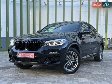 Синий БМВ Х4, объемом двигателя 2 л и пробегом 70 тыс. км за 38900 $, фото 1 на Automoto.ua