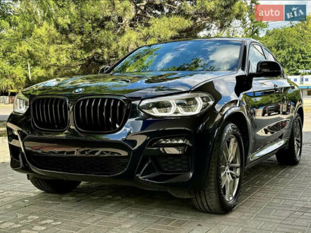 Синий БМВ Х4, объемом двигателя 2 л и пробегом 94 тыс. км за 47000 $, фото 1 на Automoto.ua