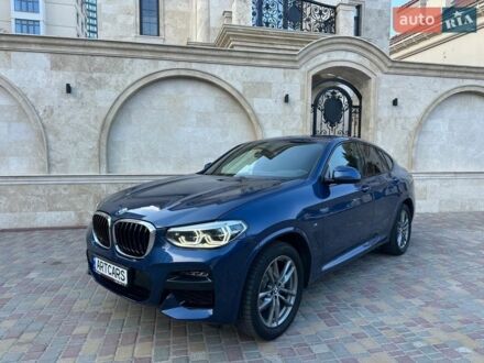 Синий БМВ Х4, объемом двигателя 2 л и пробегом 64 тыс. км за 39999 $, фото 1 на Automoto.ua