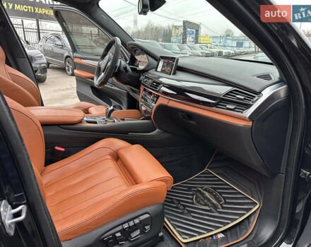 Черный БМВ Х5 М, объемом двигателя 4.39 л и пробегом 139 тыс. км за 38000 $, фото 24 на Automoto.ua