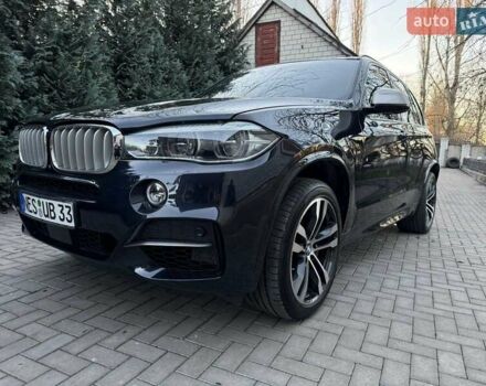 Синий БМВ Х5 М, объемом двигателя 3 л и пробегом 163 тыс. км за 39900 $, фото 1 на Automoto.ua