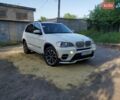Белый БМВ Х5, объемом двигателя 3 л и пробегом 238 тыс. км за 18999 $, фото 1 на Automoto.ua