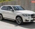Белый БМВ Х5, объемом двигателя 3 л и пробегом 131 тыс. км за 15750 $, фото 1 на Automoto.ua