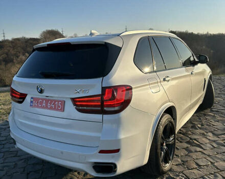 Белый БМВ Х5, объемом двигателя 3 л и пробегом 160 тыс. км за 21999 $, фото 3 на Automoto.ua