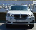 Белый БМВ Х5, объемом двигателя 3 л и пробегом 175 тыс. км за 21900 $, фото 2 на Automoto.ua