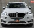 Белый БМВ Х5, объемом двигателя 3 л и пробегом 131 тыс. км за 15750 $, фото 1 на Automoto.ua