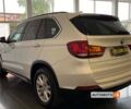 Белый БМВ Х5, объемом двигателя 3 л и пробегом 142 тыс. км за 22000 $, фото 4 на Automoto.ua