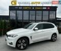 Білий БМВ Х5, об'ємом двигуна 2 л та пробігом 180 тис. км за 19900 $, фото 1 на Automoto.ua