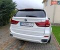 Білий БМВ Х5, об'ємом двигуна 2 л та пробігом 170 тис. км за 28900 $, фото 5 на Automoto.ua