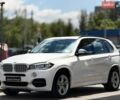 Белый БМВ Х5, объемом двигателя 3 л и пробегом 214 тыс. км за 33000 $, фото 1 на Automoto.ua