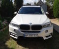 Белый БМВ Х5, объемом двигателя 2 л и пробегом 127 тыс. км за 26500 $, фото 1 на Automoto.ua