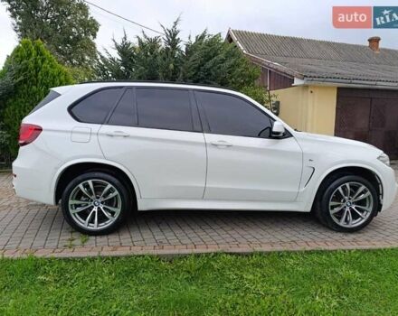 Білий БМВ Х5, об'ємом двигуна 2 л та пробігом 170 тис. км за 28900 $, фото 13 на Automoto.ua