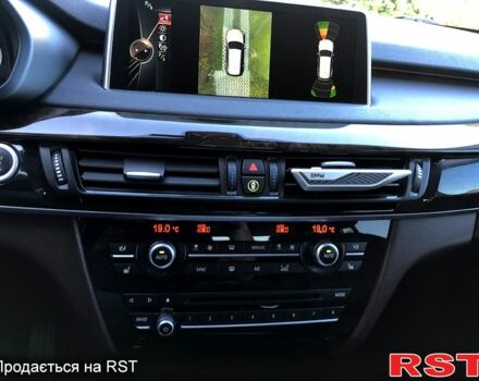 Белый БМВ Х5, объемом двигателя 3 л и пробегом 98 тыс. км за 28500 $, фото 3 на Automoto.ua