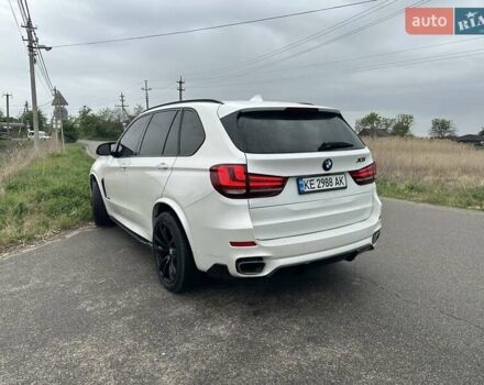 Білий БМВ Х5, об'ємом двигуна 3 л та пробігом 114 тис. км за 25000 $, фото 32 на Automoto.ua