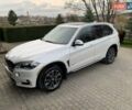Белый БМВ Х5, объемом двигателя 3 л и пробегом 138 тыс. км за 39800 $, фото 1 на Automoto.ua
