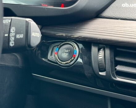 Білий БМВ Х5, об'ємом двигуна 2 л та пробігом 95 тис. км за 29990 $, фото 35 на Automoto.ua