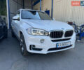 Білий БМВ Х5, об'ємом двигуна 3 л та пробігом 210 тис. км за 28500 $, фото 1 на Automoto.ua
