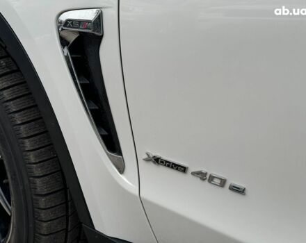 Білий БМВ Х5, об'ємом двигуна 2 л та пробігом 95 тис. км за 29990 $, фото 12 на Automoto.ua