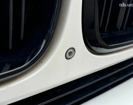 Білий БМВ Х5, об'ємом двигуна 2 л та пробігом 95 тис. км за 29990 $, фото 4 на Automoto.ua