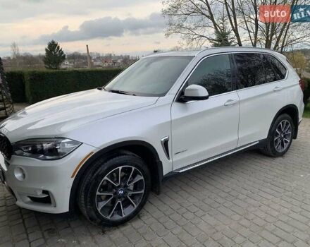 Белый БМВ Х5, объемом двигателя 3 л и пробегом 138 тыс. км за 39800 $, фото 13 на Automoto.ua