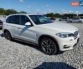 Білий БМВ Х5, об'ємом двигуна 2 л та пробігом 198 тис. км за 28700 $, фото 1 на Automoto.ua
