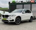 Білий БМВ Х5, об'ємом двигуна 2 л та пробігом 118 тис. км за 24990 $, фото 1 на Automoto.ua