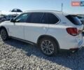 Білий БМВ Х5, об'ємом двигуна 2 л та пробігом 198 тис. км за 28700 $, фото 2 на Automoto.ua