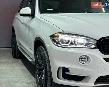 Белый БМВ Х5, объемом двигателя 2.98 л и пробегом 57 тыс. км за 34800 $, фото 1 на Automoto.ua