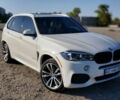 Белый БМВ Х5, объемом двигателя 2 л и пробегом 150 тыс. км за 34000 $, фото 1 на Automoto.ua
