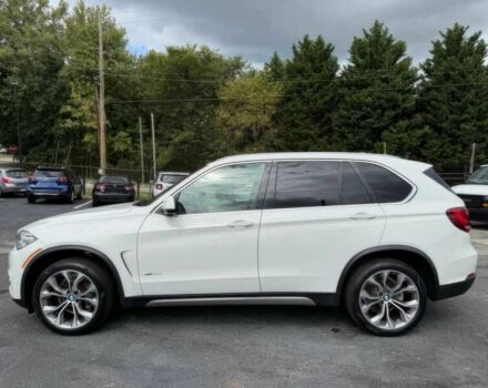 Белый БМВ Х5, объемом двигателя 3 л и пробегом 69 тыс. км за 15900 $, фото 4 на Automoto.ua