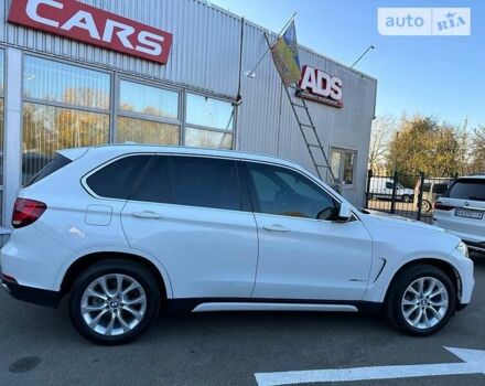 Білий БМВ Х5, об'ємом двигуна 2.98 л та пробігом 74 тис. км за 30900 $, фото 1 на Automoto.ua